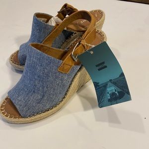 Never worn brand new , color is denim